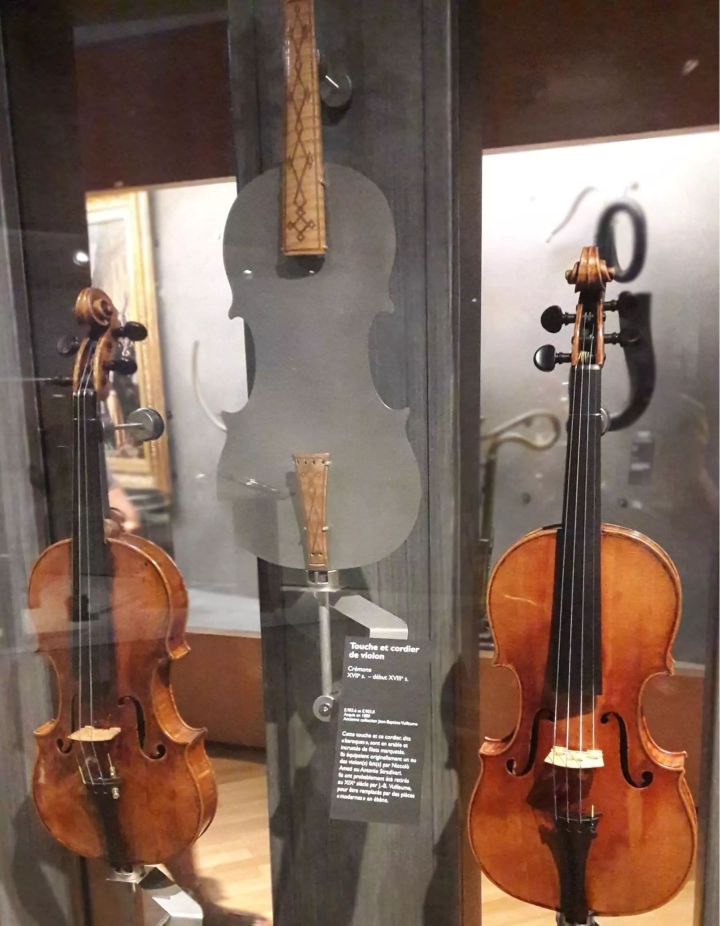 How Many Stradivarius Violins Are There -violins-made-by-Amati-and-Stradivari-with-an-example-of-ornamented-fingerboard-and-tailpiece